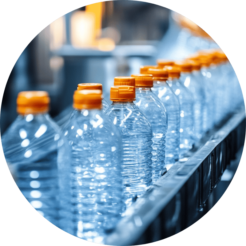 clear plastic bottles on the conveyor