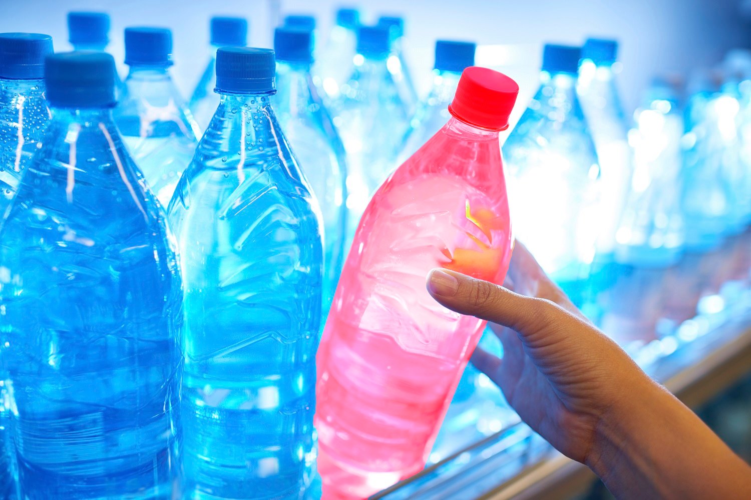 Red PET bottle together with blue bottles-1